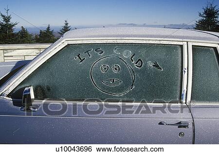 Stock Photograph - Autumn frost on a car window. Fotosearch