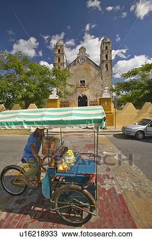 Bicycle taxi in front of Catholic cathedral of Izamal, Yucatan Peninsula, Mexico View Large Photo Image Stock Image - Bicycle taxi in front of Catholic cathedral of Izamal, Yucatan Peninsula, Mexico. Fotosearch