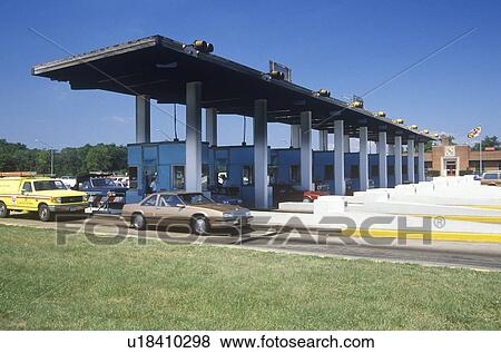 Stock Photo - Cars waiting to cross the toll gate, Maryland. Fotosearch