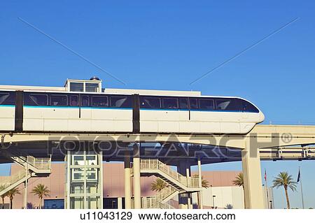 Monorail train with tourists in Las Vegas, NV View Large Photo Image Stock Photo - Monorail train with tourists in Las Vegas, NV. Fotosearch