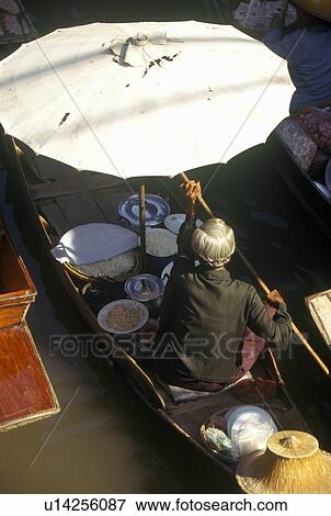Stock Photo - The Floating Market at Damnoen Saduak outside of Bangkok, Thailand. Fotosearch