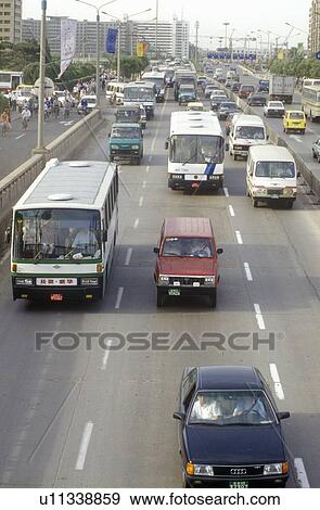 Traffic on the streets of Beijing, People's Republic of China View Large Photo Image Stock Photo - Traffic on the streets of Beijing, People's Republic of China. Fotosearch