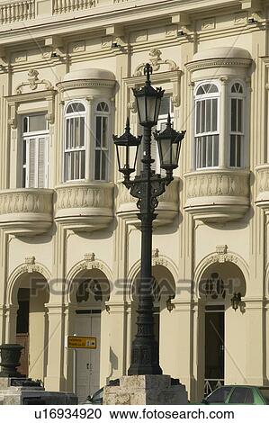 Lamppost in foreground with old historic restored buildings of Old Havana View Large Photo Image Stock Image - Lamppost in foreground with old historic restored buildings of Old Havana. Fotosearch