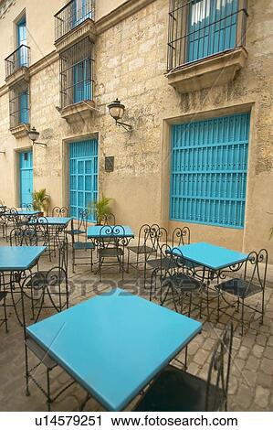 Stock Image - Turquoise tables and doorways in the historic section of Old Havana. Fotosearch
