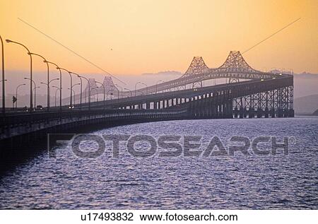 Fog rolling in on the Bay Bridge, San Francisco, California View Large Photo Image Stock Image - Fog rolling in on the Bay Bridge, San Francisco, California. Fotosearch