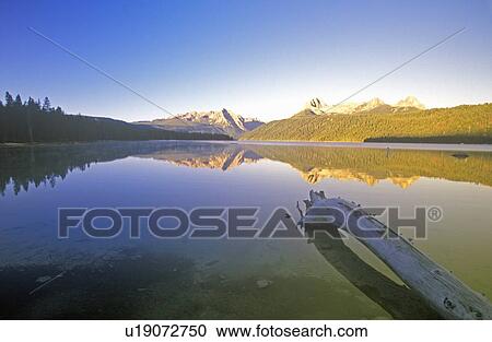 Stock Image - Redfish Lake and Sawtooth Mountains at Sunrise, Idaho. Fotosearch