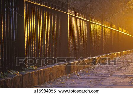 Stock Photography - Wrought Iron Fence at dawn, Gramercy Park, NY City. Fotosearch