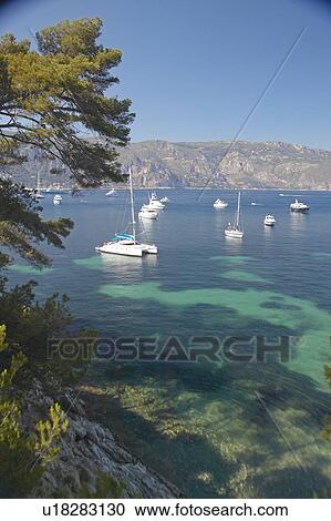 Stock Image - Boats docked near Patoma Beach, near Villefranche sur Mer. Fotosearch