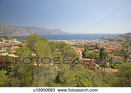 Stock Image - Looking down on hillside homes. Fotosearch