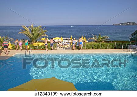Swimming pool at the Resident Eiffel, Beaulieu-Sur-Mer View Large Photo Image Stock Photo - Swimming pool at the Resident Eiffel, Beaulieu-Sur-Mer. Fotosearch