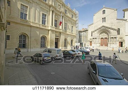 Stock Image - The church of St. Trophime (building w/brown doors), Arles, France. Fotosearch