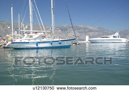 Yacht in port at Saint Jean Cap Ferrat, French Riviera, France View Large Photo Image Stock Image - Yacht in port at Saint Jean Cap Ferrat, French Riviera, France. Fotosearch