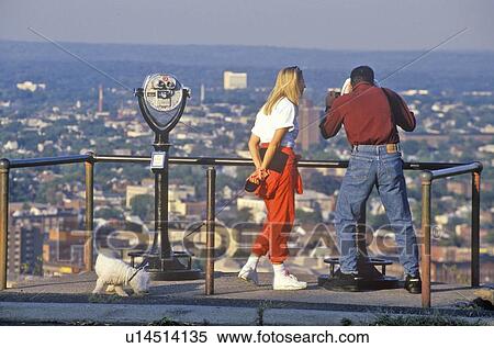 Stock Photography - Couple looking over Patterson. Fotosearch