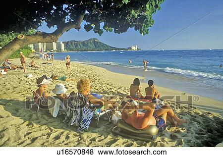 Tourists at Waikiki Beach View Large Photo Image Stock Photo - Tourists at Waikiki Beach. Fotosearch