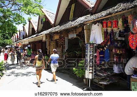 Stock Photography - Shops on the right side of street. Fotosearch