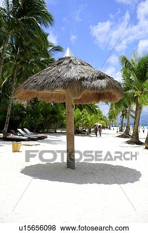 Stock Photo - Sunshade on the beach of Boracay island. Fotosearch