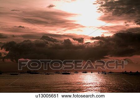 Yacht traveling at the sunset View Large Photo Image Stock Image - Yacht traveling at the sunset. Fotosearch