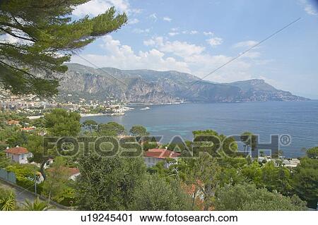 Looking out over town View Large Photo Image Stock Image - Looking out over town. Fotosearch