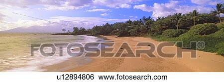 Beach at sunset View Large Photo Image Stock Photograph - Beach at sunset. Fotosearch