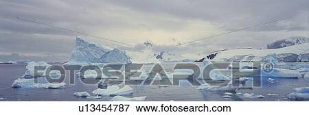 Stock Photo - Panoramic view of glaciers and icebergs . Fotosearch
