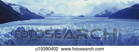 Panoramic view of icy formations of a glacier View Large Photo Image Stock Image - Panoramic view of icy formations of a glacier . Fotosearch