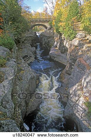 Stock Photo - Baptism River flowing into Lake Superior, Tettegouche State Park. Fotosearch