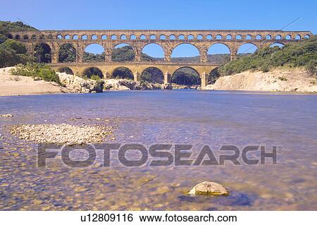 River Gard and the Pont du Gard, Nimes, France View Large Photo Image Stock Photograph - River Gard and the Pont du Gard, Nimes, France. Fotosearch