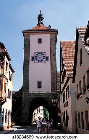 Stock Photo - street, shadow, roof top, blue sky, doorway, entrance, travel destination. Fotosearch