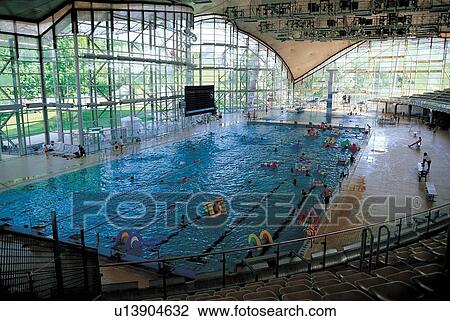 Stock Image - swimmers, exercise, event, liquid, indoor, recreation, indoor pool. Fotosearch