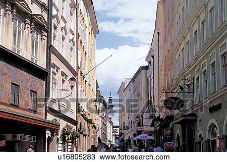 Stock Image - sky, sun shine, society, people, buildings, outdoor, locality. Fotosearch