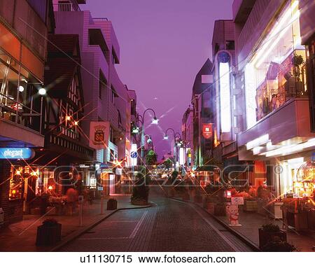 Stock Photography -  a Shopping District in Yokohama City at Night, With Several Signboards and Shops, Front View, Lens Flare, Yokohama City, Kanagawa Prefecture, Japan. Fotosearch