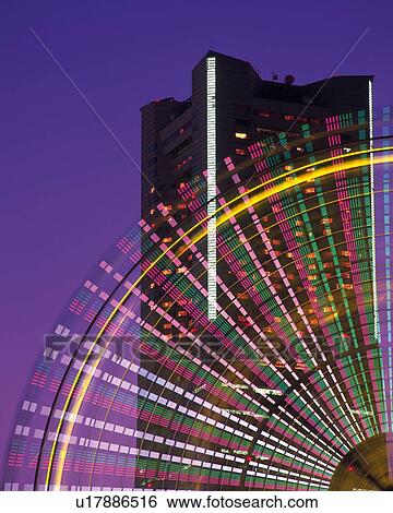 an Illuminated Ferris Wheel, In Front of the Landmark Tower, Yokohama City, Kanagawa Prefecture, Japan View Large Photo Image Stock Photograph - an Illuminated Ferris Wheel, In Front of the Landmark Tower, Yokohama City, Kanagawa Prefecture, Japan. Fotosearch