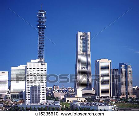 Several Buildings and Skyscrapers Under a Blue Sky, Front View, Far View, Yokohama City, Kanagawa Prefecture, Japan View Large Photo Image Stock Image - Several Buildings and Skyscrapers Under a Blue Sky, Front View, Far View, Yokohama City, Kanagawa Prefecture, Japan. Fotosearch