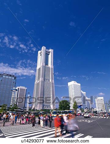 Several Buildings and Skyscrapers Behind a Zebra Crossing With a Large Group of People, Yokohama City, Kanagawa Prefecture, Japan View Large Photo Image Stock Photo - Several Buildings and Skyscrapers Behind a Zebra Crossing With a Large Group of People, Yokohama City, Kanagawa Prefecture, Japan. Fotosearch