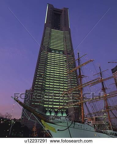 the Nihonmaru Ship In Front of the Landmark Tower By Night, Low Angle View, Yokohama City, Kanagawa Prefecture, Japan View Large Photo Image Stock Image - the Nihonmaru Ship In Front of the Landmark Tower By Night, Low Angle View, Yokohama City, Kanagawa Prefecture, Japan. Fotosearch