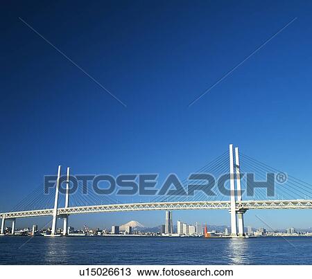 the Yokohama Bay Bridge Under a Blue Sky, Spreading Across the Ocean, Low Angle View, Yokohama City, Kanagawa Prefecture, Japan View Large Photo Image Stock Image - the Yokohama Bay Bridge Under a Blue Sky, Spreading Across the Ocean, Low Angle View, Yokohama City, Kanagawa Prefecture, Japan. Fotosearch