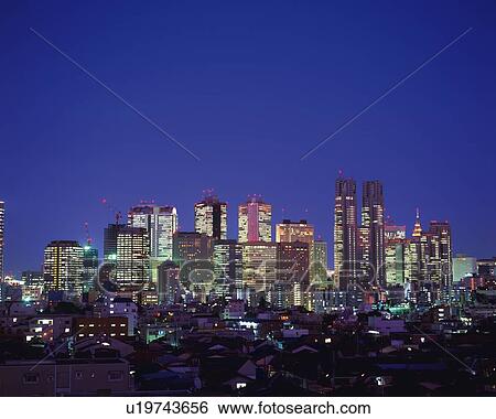 Stock Photograph - High rise buildings, night. Fotosearch