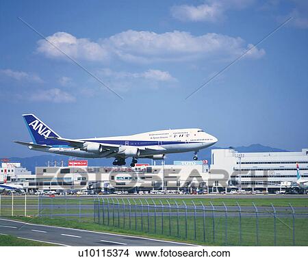 Airplane Landing at Fukuoka Airport View Large Photo Image Picture - Airplane Landing at Fukuoka Airport. Fotosearch