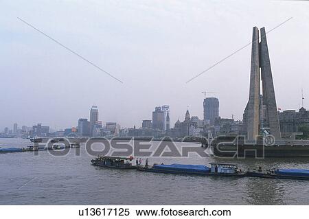 Stock Photography -  a Bay in Shanghai on a Cloudy Day, Several Buildings in the Background, Shanghai, China. Fotosearch