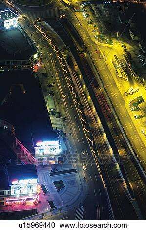 a Huge Road in Shanghai By Night, With Several Houses and Vehicles on the Side, High Angle View, Shanghai, China View Large Photo Image Stock Image - a Huge Road in Shanghai By Night, With Several Houses and Vehicles on the Side, High Angle View, Shanghai, China. Fotosearch