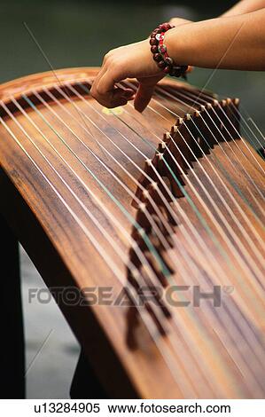 a Person Playing the Koto, High Angle View, Shanghai, China View Large Photo Image Stock Photography - a Person Playing the Koto, High Angle View, Shanghai, China. Fotosearch