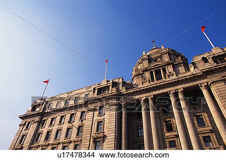 a Western-styled Building With Several Pillars Under a Blue Sky, Low Angle View, Shanghai, China View Large Photo Image Picture - a Western-styled Building With Several Pillars Under a Blue Sky, Low Angle View, Shanghai, China. Fotosearch