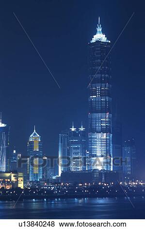 an Illuminated Bank Building By Night, Low Angle View, Shanghai, China View Large Photo Image Stock Photo - an Illuminated Bank Building By Night, Low Angle View, Shanghai, China. Fotosearch