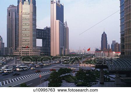 Several Buildings and Skyscrapers In Front of a Huge Road, Side View, Shanghai, China View Large Photo Image Stock Image - Several Buildings and Skyscrapers In Front of a Huge Road, Side View, Shanghai, China. Fotosearch