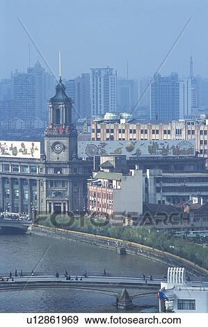 Several Buildings and Skyscrapers of Shanghai, a River and a Bridge In Front, High Angle View, Shanghai, China View Large Photo Image Stock Photo - Several Buildings and Skyscrapers of Shanghai, a River and a Bridge In Front, High Angle View, Shanghai, China. Fotosearch