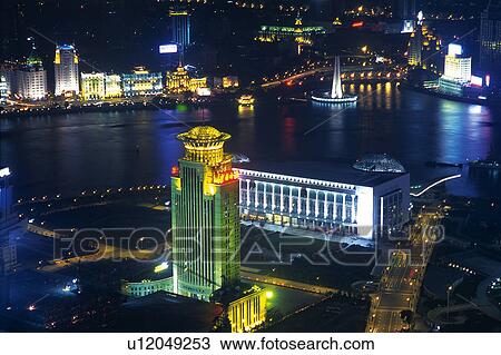 Stock Image -  Several Buildings of Shanghai at Night, Illuminated in Different Colors, High Angle View, Shanghai, China. Fotosearch