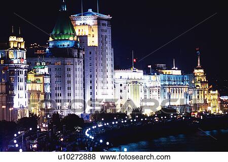 Several Shanghai Buildings at Night, Illuminated, a Road In Front, Side View, Shanghai, China View Large Photo Image Stock Photo - Several Shanghai Buildings at Night, Illuminated, a Road In Front, Side View, Shanghai, China. Fotosearch