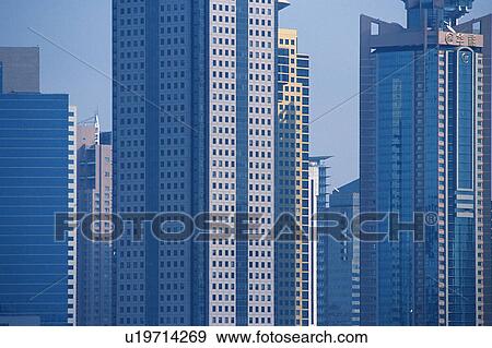 Several Skyscrapers Lined Up Next to Each Other, Front View, Shanghai, China View Large Photo Image Stock Photo - Several Skyscrapers Lined Up Next to Each Other, Front View, Shanghai, China. Fotosearch