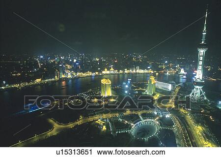 Shanghai By Night With a Bunch of Illuminated Buildings, High Angle View, Shanghai, China View Large Photo Image Stock Image - Shanghai By Night With a Bunch of Illuminated Buildings, High Angle View, Shanghai, China. Fotosearch