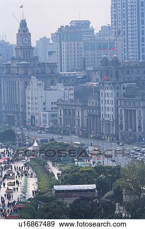 Stock Photo -  Shanghai City on a Cloudy Day, With Several Buildings Surrounding a Major Road, High Angle View, Shanghai, China. Fotosearch